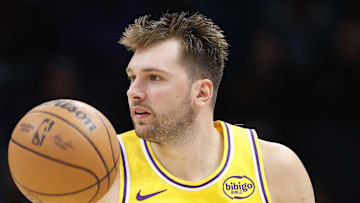 Nov 10, 2025; Charlotte, North Carolina, USA; Los Angeles Lakers forward/guard Luka Doncic (77) brings the ball up the court during the second quarter at Spectrum Center. Mandatory Credit: Brian Westerholt-Imagn Images
