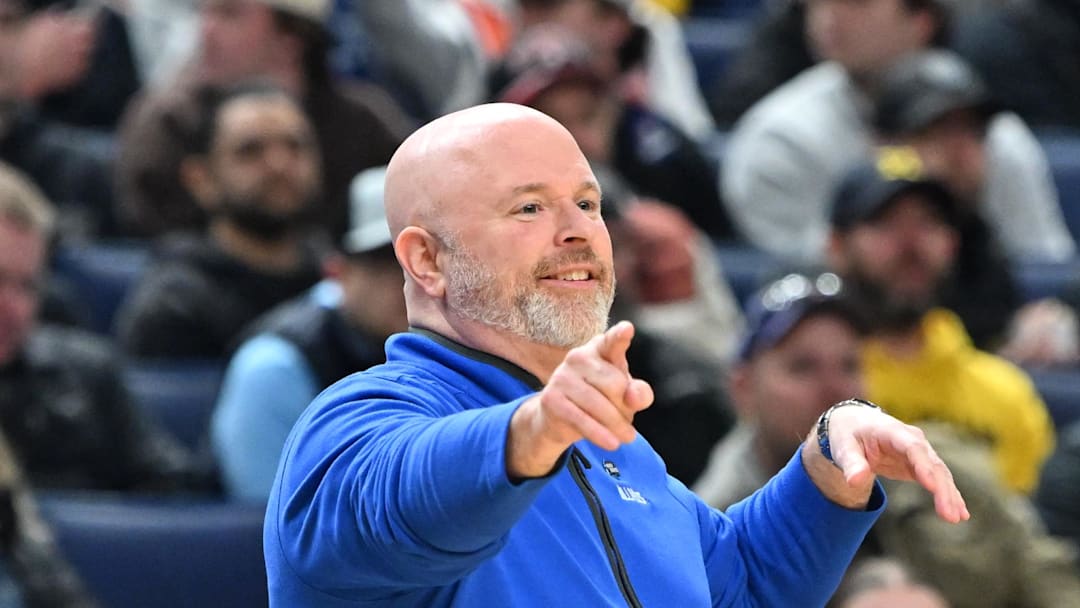 Mar 19, 2026; Buffalo, NY, USA; Saint Louis Billikens head coach Josh Schertz instructs his team against the Georgia Bulldogs during the first half of a first round game of the men's 2026 NCAA Tournament at Keybank Center. Mandatory Credit: Mark Konezny-Imagn Images