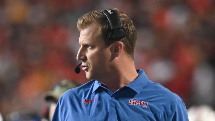 SMU Mustangs coach Rhett Lashlee walks down the sidelines during the first half against the Maryland Terrapins at Capital One Field at Maryland Stadium.