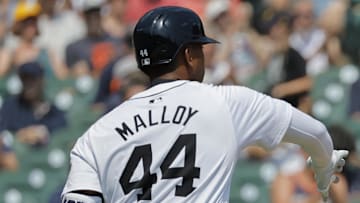 Aug 4, 2024; Detroit, Michigan, USA;  Detroit Tigers shortstop  Javier Baez (28) receives congratulations from Detroit Tigers outfielder Justyn-Henry Malloy (44) after scoring in the fifth inning against the Kansas City Royals at Comerica Park