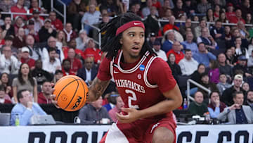Mar 22, 2025; Providence, RI, USA; Arkansas Razorbacks guard Boogie Fland (2) dribbles against St. John's Red Storm guard Aaron Scott (0) during the second half of a second round men’s NCAA Tournament game at Amica Mutual Pavilion. Mandatory Credit: Gregory Fisher-Imagn Images