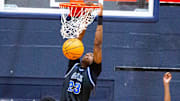 Gibbs High School center Mike Broxton jr (23) slam dunks the ball in the first half. Gibbs High School played St. Thomas Aquinas in the championship game of the Kingdom of the Sun at Vanguard High School in Ocala, FL on Monday, December 30, 2024. St. Thomas Aquinas defeated the Raiders 80-64. [Doug Engle/Ocala Star Banner]