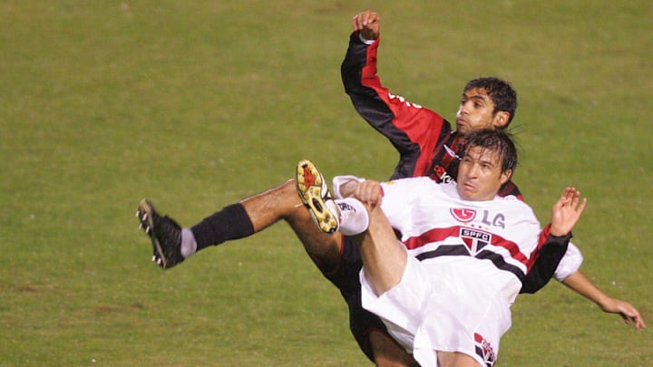 Sao Paulo's Luizao (front) vies for the