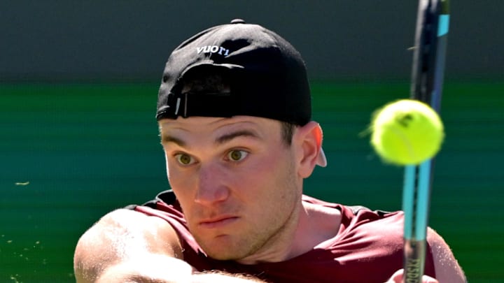 Jack Draper hits a shot