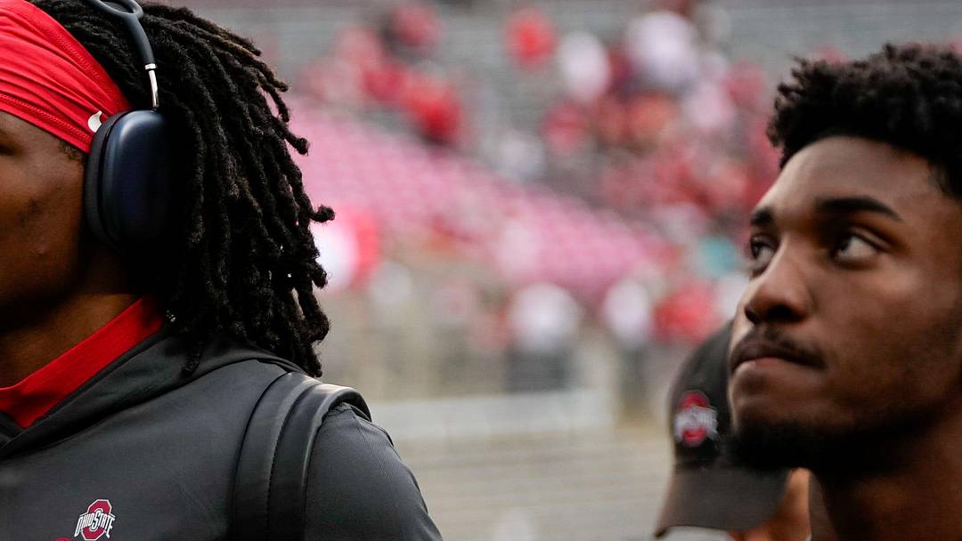 Wide receiver Jeremiah Smith (4) walks on the field before the Ohio State football spring game.