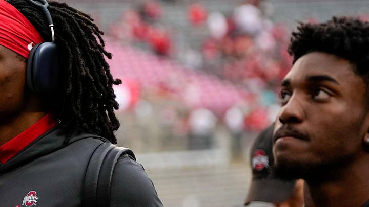 Wide receiver Jeremiah Smith (4) walks on the field before the Ohio State football spring game.