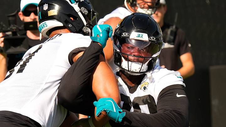 Jacksonville Jaguars defensive tackle Ruke Orhorhoro (99) runs a blocking drill with Jacksonville Jaguars defensive tackle Arik Armstead (91) during the Jaguars final Organized Team Activity on Monday, June 15, 2026 at the Miller Electric Center in Jacksonville, Fla. [Doug Engle/Florida Times-Union]