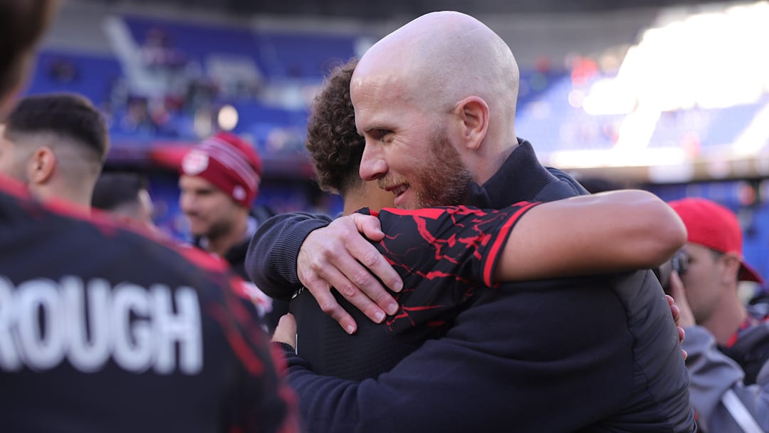 Michael Bradley (right) embraces Julian Hall (left) after the youngster scored his third goal in two matches. 