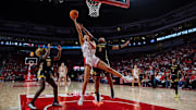 Nebraska basketball forward Natalie Potts (22) fights to score against Southeastern Louisiana.
