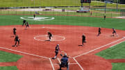 Tabithah Taylor of Bryan drops down a bunt in the 2024 Division II state semifinals against Logan Elm to bring in the game-winning run. 