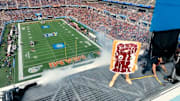 The 2023 Pop-Tarts Bowl mascot celebrates atop Camping World Stadium.