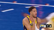 Tyrese Haliburton does choke celebration.