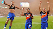 Evander, middle, scored a late goal to send FC Cincinnati to the MLS Cup Playoffs for the fourth-straight season. 