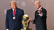 Donald Trump (left) was the first recipient of the FIFA Peace Prize drawn up by Gianni Infantino.