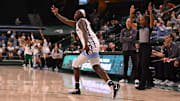 Tulane Women's Basketball celebrates a three-pointer