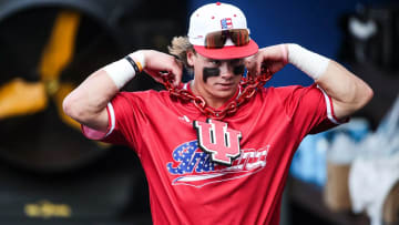 Indiana outfielder Carter Mathison wears the home run chain.