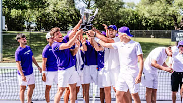 The TCU Men's Tennis team hoists the Big 12 regular season championship trophy after sweeping Baylor 4-0 on Sunday afternoon. 