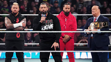 The Bloodline cuts a promo during WWE SmackDown, lead by Roman Reigns.