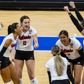 Nebraska volleyball celebrates a point in the National Semifinal against Pitt.