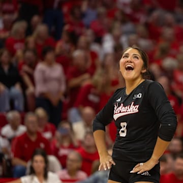 Nebraska volleyball libero Lexi Rodriguez (left) and outside hitter Harper Murray (right) react during play at the Husker Invitational.