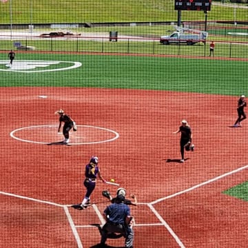 Tabithah Taylor of Bryan drops down a bunt in the 2024 Division II state semifinals against Logan Elm to bring in the game-winning run. 