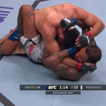 Kelvin Gastelum scores a takedown in round three of his UFC Fight Night clash with Daniel Rodriguez in Saudi Arabia.