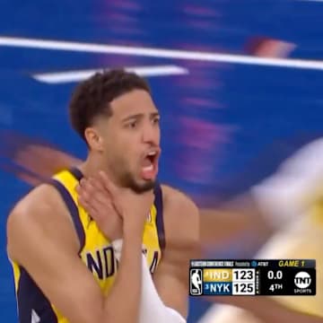 Tyrese Haliburton does choke celebration.