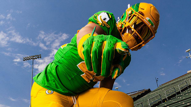 Teitum Tuioti models Oregon Duck Football’s uniform for their season opener against Montana State at Autzen Stadium