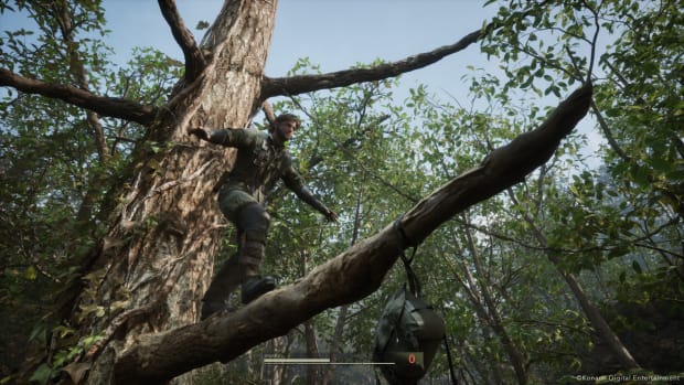 Metal Gear Solid Delta: Snake Eater screenshot of Snake balancing on a tree branch