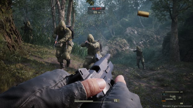 Metal Gear Solid Delta: Snake Eater first-person combat screenshot featuring Snake reloading his pistol.