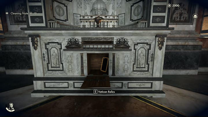 A model of the Vatican with the bottom compartment open, revealing a hidden map.