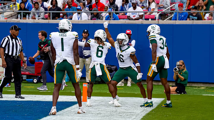 Baylor WRs Ashtyn Hawkins, Kobe Prentice, Josh Cameron and TE Michael Trigg celebrate after a touchdown