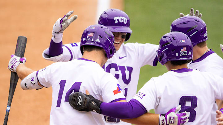 TCU players celebrate a home run from Jack Bell. TCU players celebrate a home run from Jack Bell.