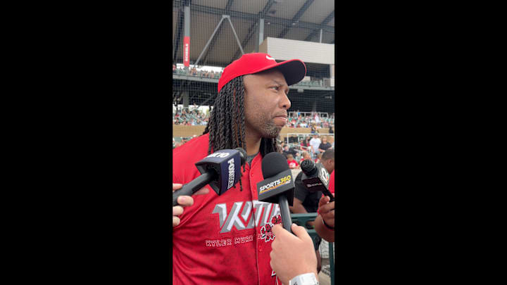 Larry Fitzgerald speaks with reporters. Larry Fitzgerald speaks with reporters.