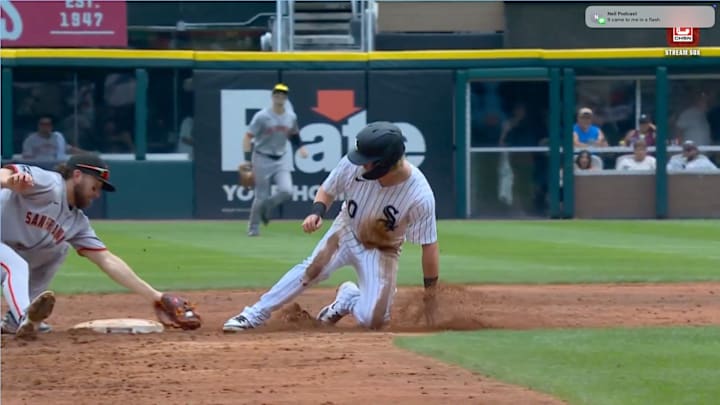 Chase Meidroth slides into second base against the San Francisco Giants.
