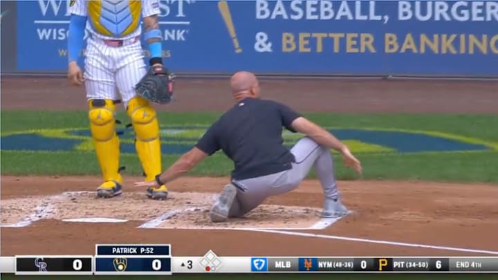 Rockies interim manager Warren Schaeffer in the process of getting ejected.