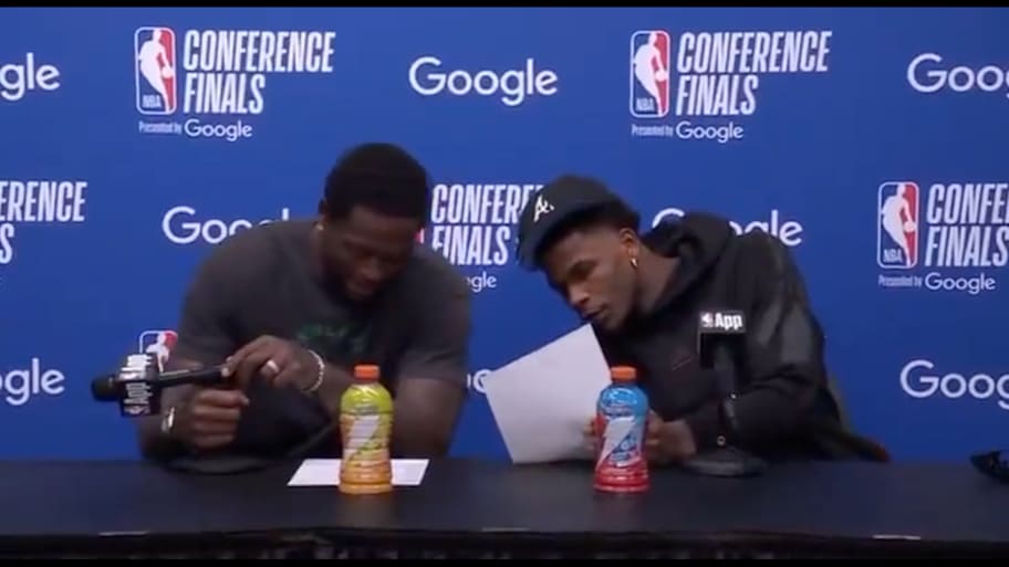 Anthony Edwards and Julius Randle look at the box score from Game 1 of the Western Conference finals. | @NBA / X