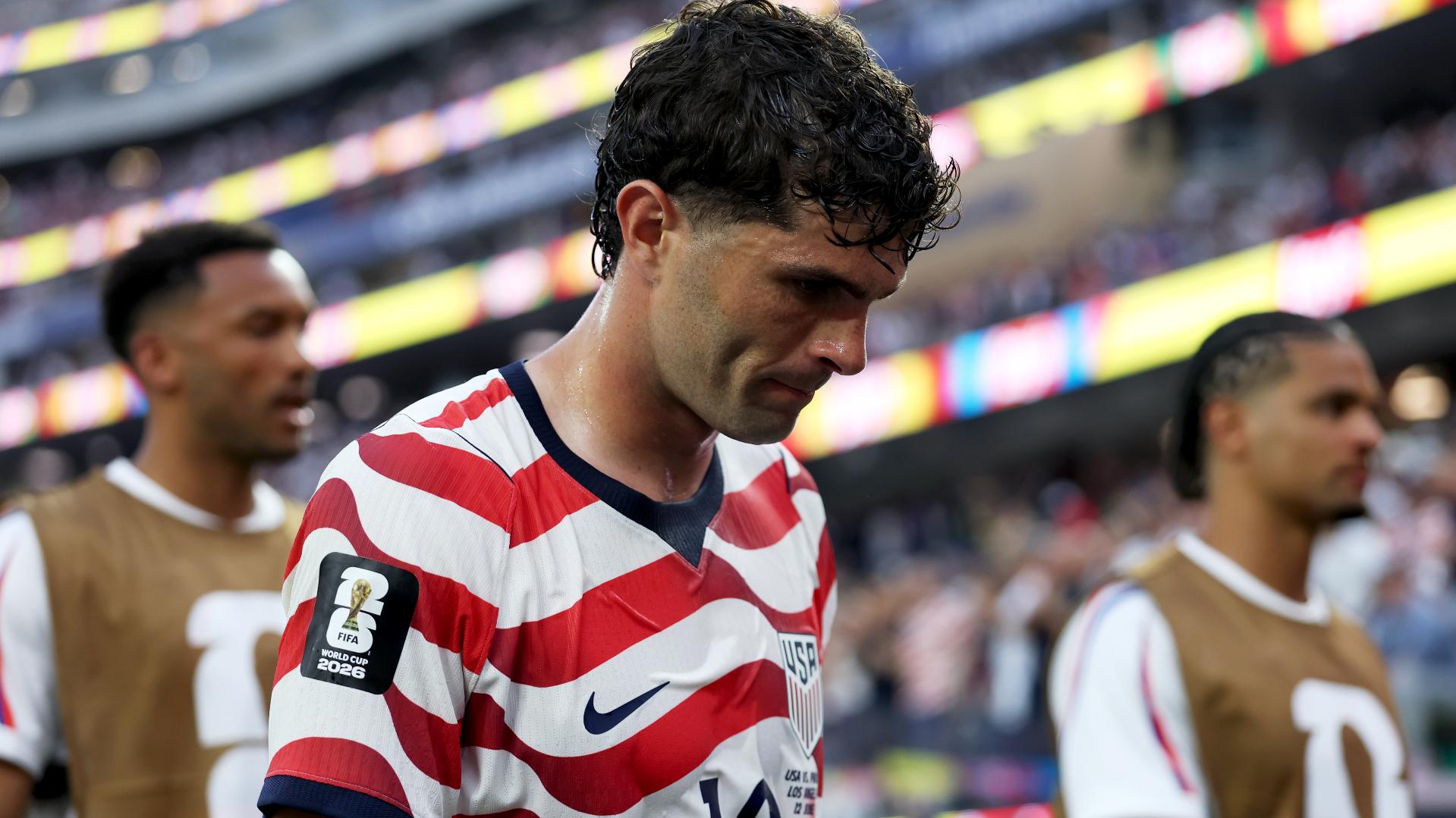 Christian Pulisic with his head bowed.