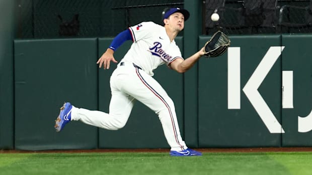 Texas Rangers center fielder Wyatt Langford makes a running catch during the fourth inning against the Los Angeles Angels.
