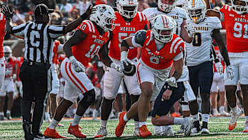 Mercer defensive lineman Andrew Zock (0)