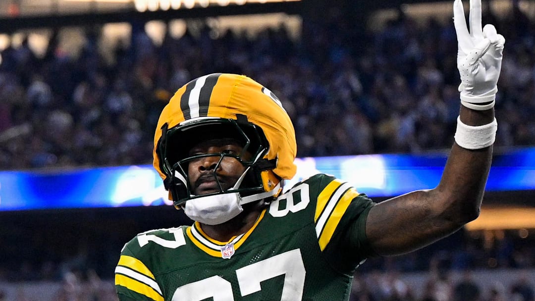 Green Bay Packers receiver Romeo Doubs (87) celebrates one of his three touchdowns at Dallas.