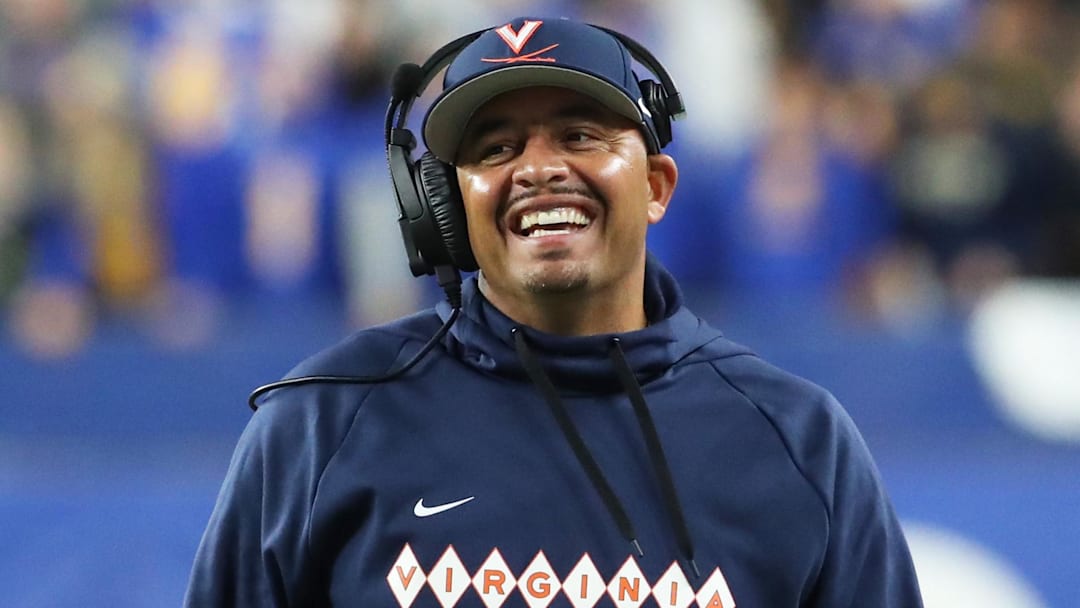 Nov 9, 2024; Pittsburgh, Pennsylvania, USA;  Virginia Cavaliers head coach Tony Elliott reacts on the sidelines against the Pittsburgh Panthers during the second quarter at Acrisure Stadium. Mandatory Credit: Charles LeClaire-Imagn Images
