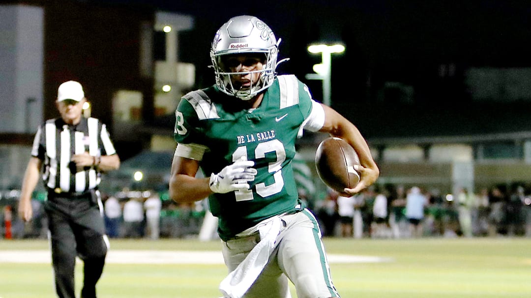 De La Salle quarterback Toa Faavae scores one of his two rushing touchdowns on Friday night.