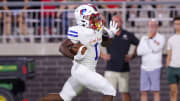 Little Rock Parkview running back Monterrio Elston scores one of his two rushing touchdowns Saturday night. 