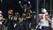 Bryant wide receiver Javin Dames celebrates a touchdown with teammates