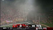 Smoke descends on the stadium due to a fire in a food truck during a matchup between NC State and Wake Forest.