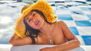 Salma Hayek Pinault was photographed by Ruven Afanador in Mexico. Hat by Alémais. Necklace by Jacquie Aiche.
