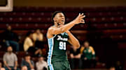 Tulane basketball player Curtis Williams, Jr Celebrates another TU Basket