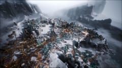 Frostpunk 2 screenshot of a city in an icy landscape.
