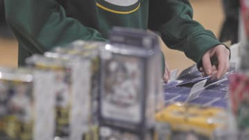 Card collectors strike deals to make their ideal decks at the Mosinee Card Show in Mosinee, Wis. on Saturday, Mar 1, 2025. Hosted by card enthusiasts Joe Toffery and Jeremy Schecklman, the show held every other month has grown in size from only 20 tables when they began just over a year ago to now over 85 tables filled with collectors.